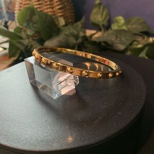 Kate Spade round gold tone bangle bracelet